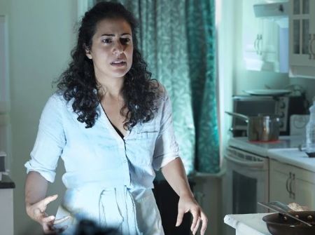 Nadine Malouf caught at on camera during shooting for a film.